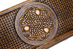 The interior view of the open Hrachya Ohanyan braid motif set highlighting the smooth wood finish and professional playing lanes.