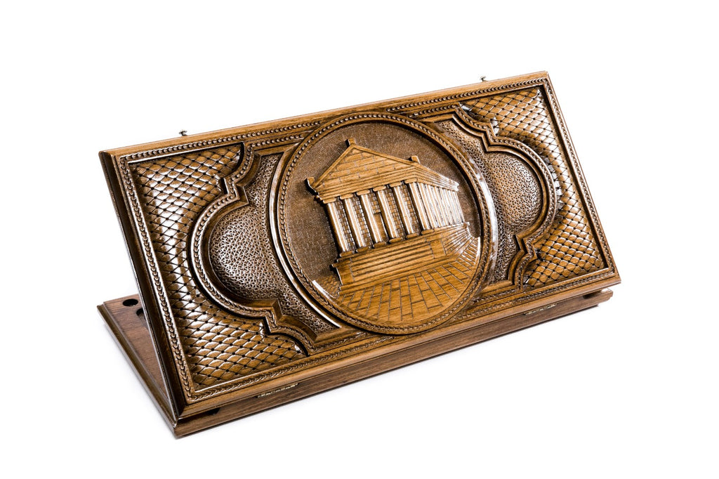 A frontal shot of the closed Garni Temple classic backgammon board showing the detailed colonnade relief carving.
