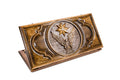 A frontal shot of the closed Eagle and Octagram backgammon board showing the detailed bird and star relief carving.