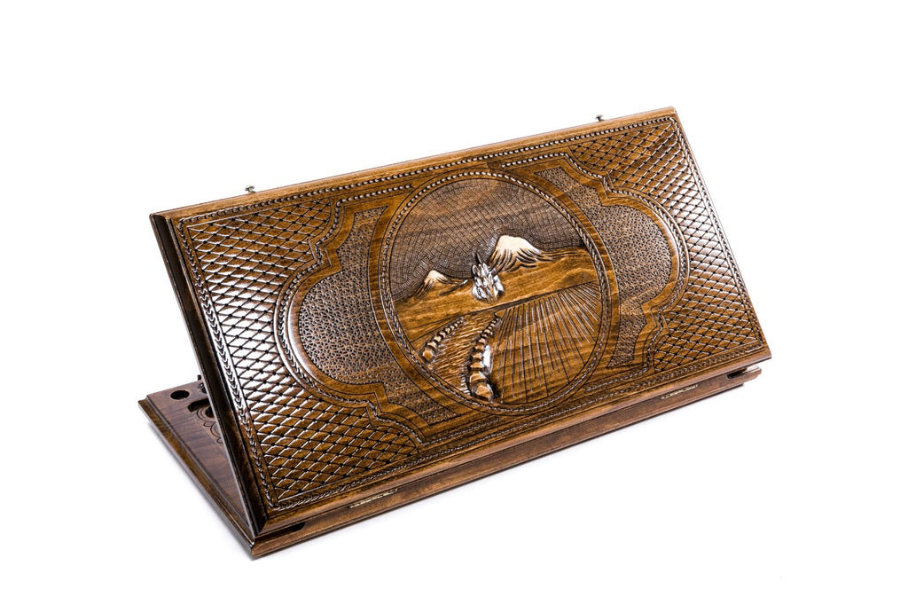 A frontal shot of the closed Mount Ararat classic backgammon board showing the detailed mountain peak relief carving.