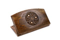 A frontal shot of the closed Pomegranate and Grape backgammon board featuring the fruit relief inside the copyrighted Arch-Style outline.