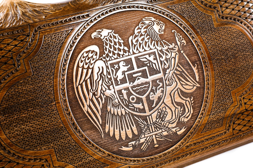 The interior view of the open Hrachya Ohanyan Armenian emblem board highlighting the smooth wood finish and professional playing lanes.