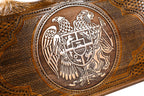 The interior view of the open Hrachya Ohanyan Armenian emblem board highlighting the smooth wood finish and professional playing lanes.