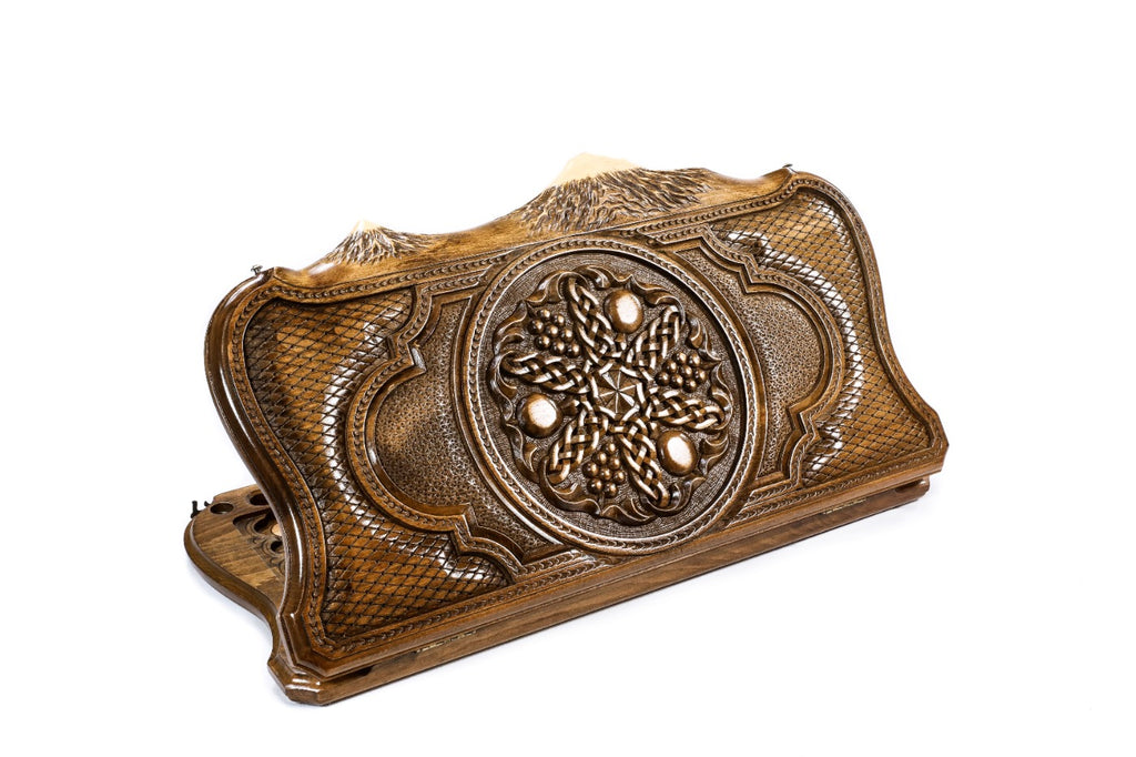 A frontal shot of the closed Pomegranate and Grape backgammon board carved inside the copyrighted Mount Ararat outline.