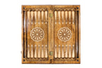 Carved Tiger backgammon board - playing pieces and dice arranged on the board