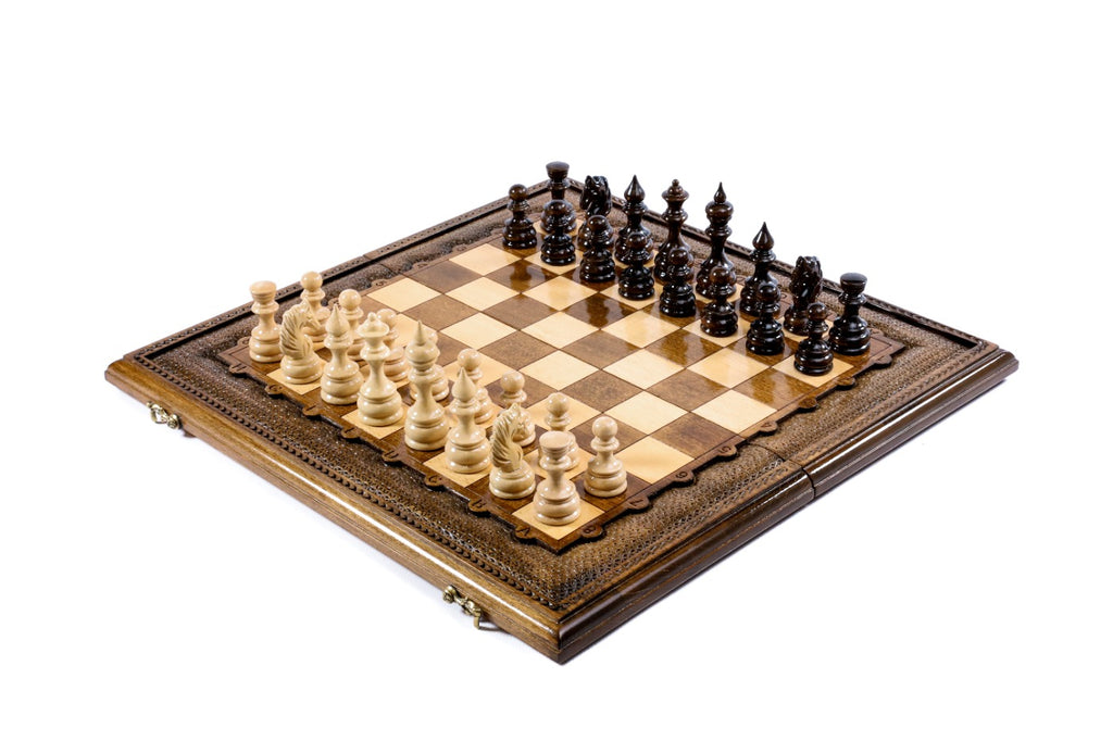 Luxury wooden chess and backgammon set with hand-carved textured frame, pieces set for play