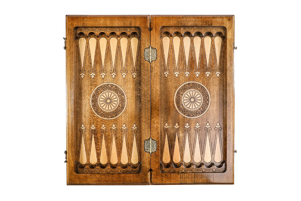 Backgammon field of the combo set laid flat, carved points and central wheel ornaments