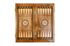 Backgammon field of the combo set laid flat, carved points and central wheel ornaments
