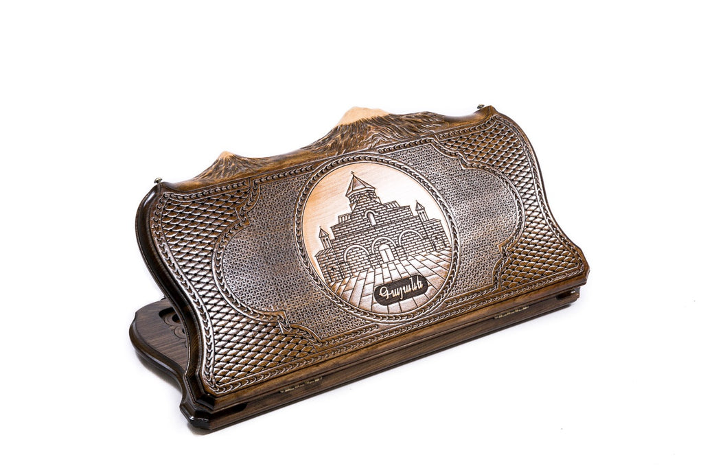 A frontal shot of the closed St. Gayane backgammon board featuring the church relief carved inside the copyrighted Mount Ararat outline.