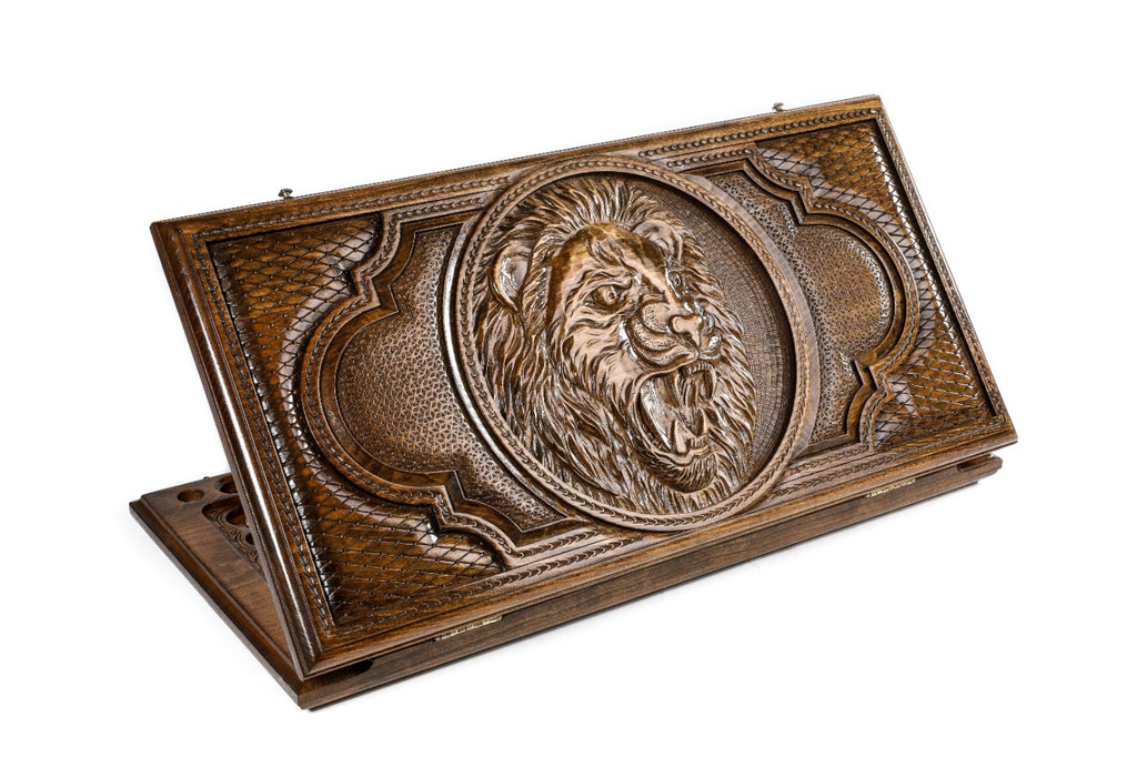 A frontal shot of the closed Lion classic backgammon board by Hrachya Ohanyan showing the detailed high-relief lion carving.