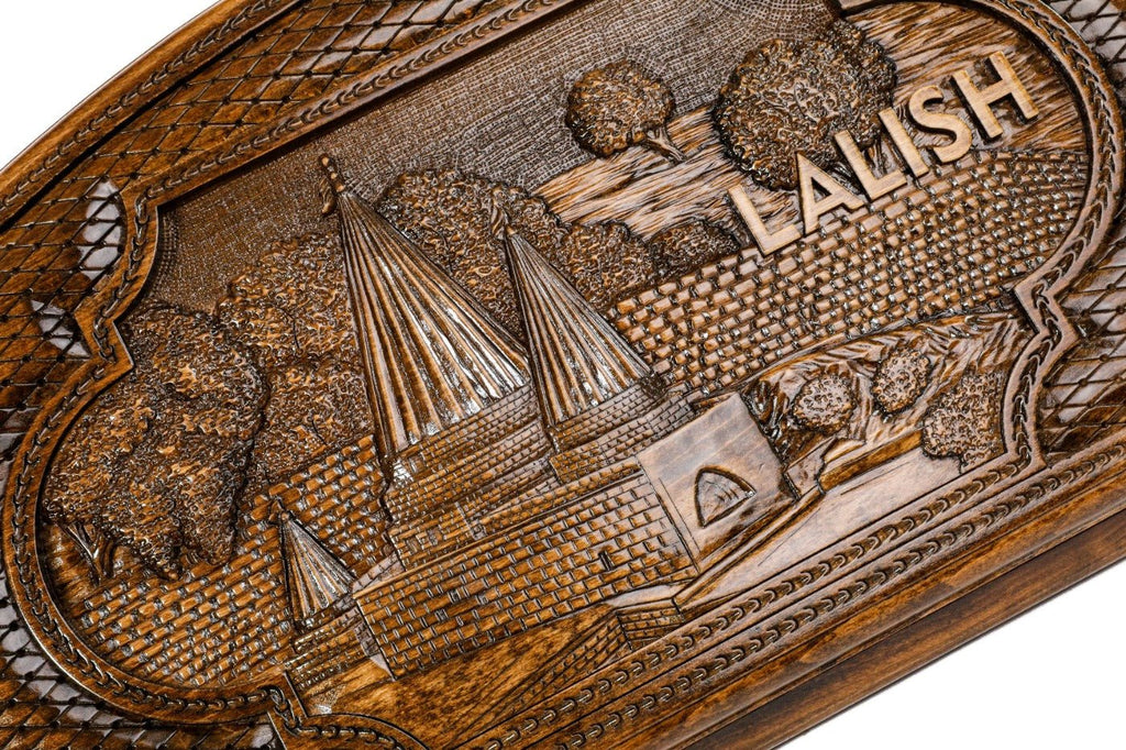 Detail view of the hand-carved Yazidi sacred site on the solid wood exterior.