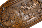 Detail view of the hand-carved Yazidi sacred site on the solid wood exterior.