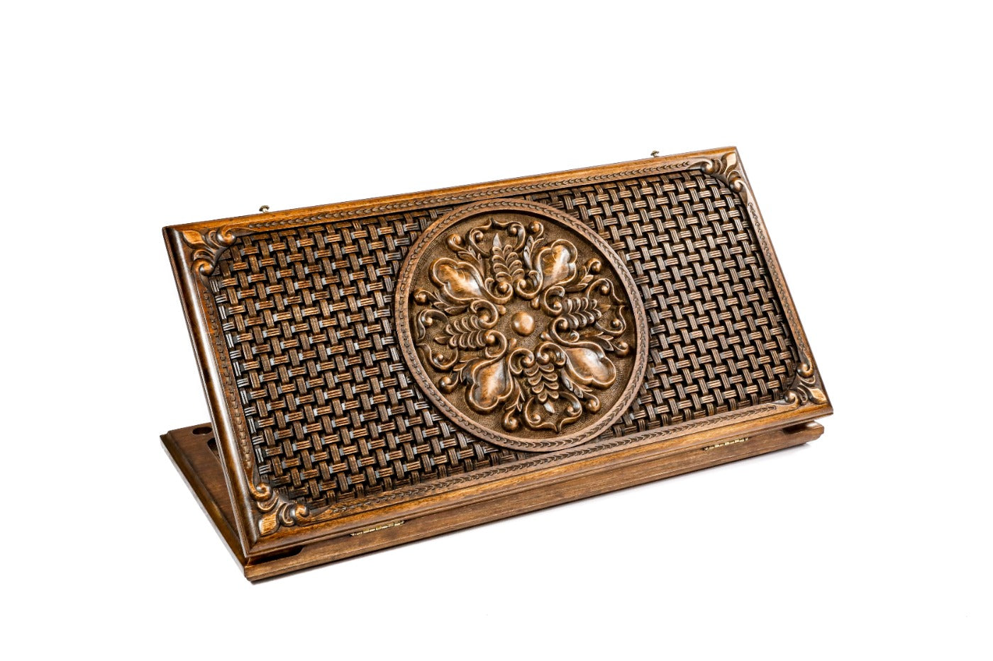 Closed backgammon board featuring deep ornamental bas-relief hand-carvings.