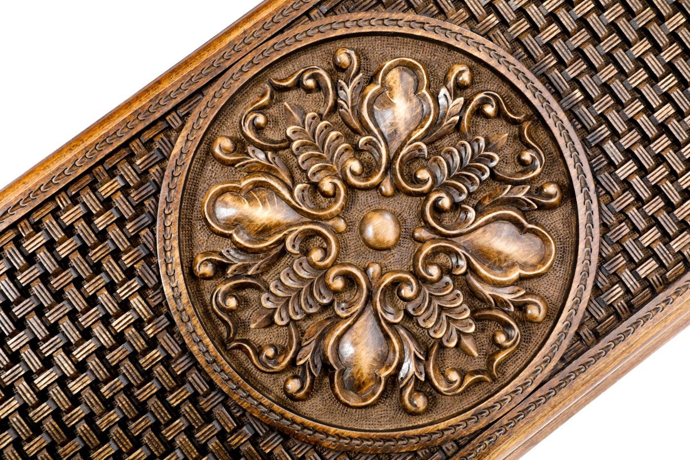 Side view showing the texture and depth of the ornamental wood relief.