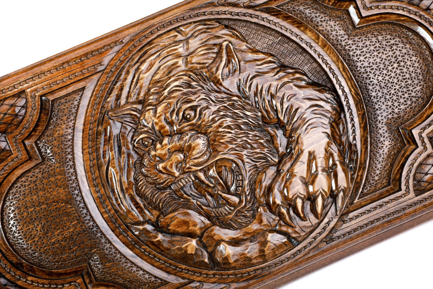 The interior of the open wooden backgammon board highlighting the smooth, polished playing lanes and natural wood grain.