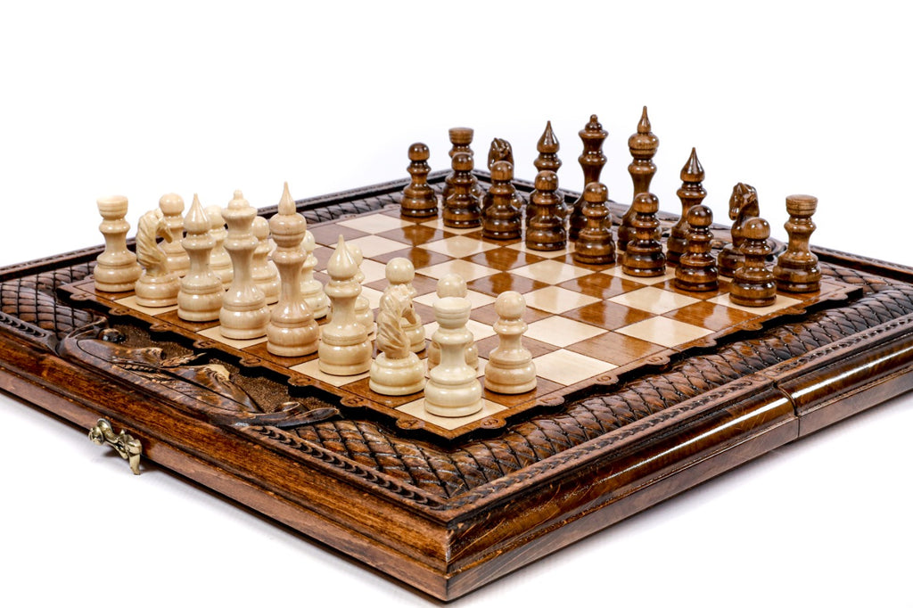 Hand-carved wooden chess board with lattice border and Ararat relief, pieces in position, close angle