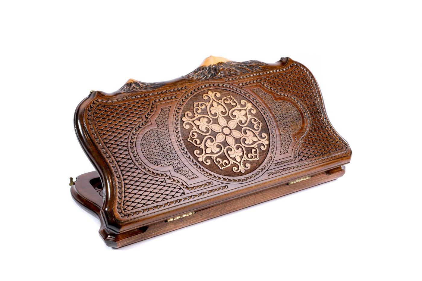 A top-down view of the closed wooden backgammon case highlighting the symmetrical snowflake patterns inside the Mount Ararat silhouette