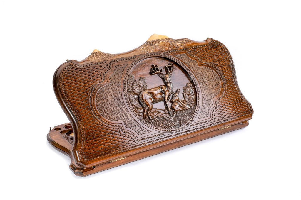 A frontal perspective of the closed wooden backgammon board showcasing the elegant deer carving and Mount Ararat silhouette.