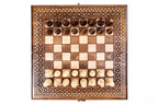 Classic Carpet Design / chess and backgammon set - close-up of hand-carved chess pieces