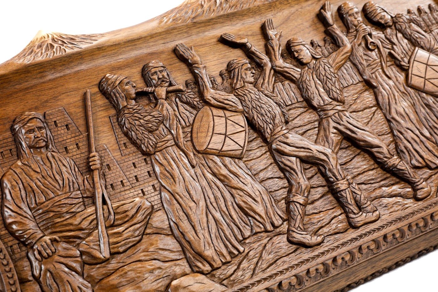 Frontal view of the heroic Armenian dance relief on the Hrachya Ohanyan solid wood board.