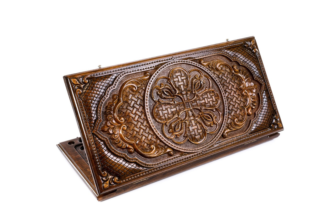 A frontal shot of the closed Ornamental Bas-Relief backgammon board showing the symmetrical interlacing wood carvings.