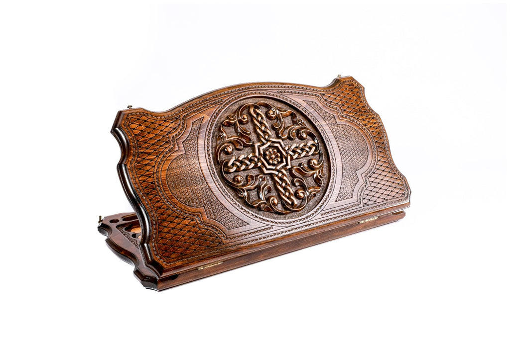 A frontal shot of the closed Ornamental Braid backgammon board featuring the interlaced pattern carved inside the copyrighted Mount Ararat outline.