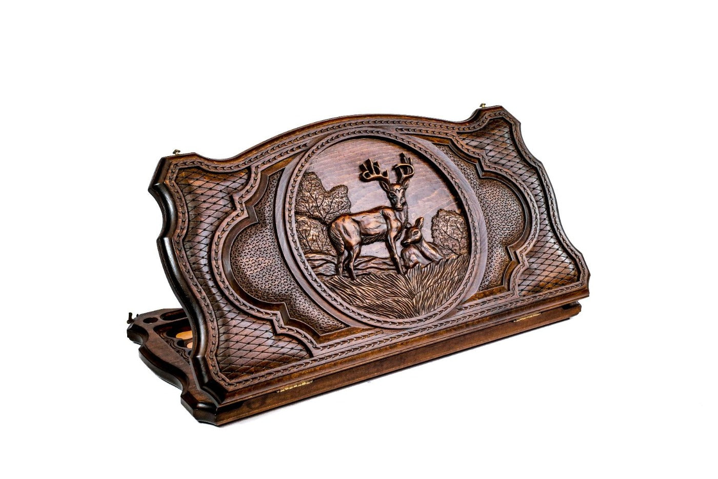 Exterior view of the wooden backgammon board featuring the detailed deer motif and copyrighted contour outline.