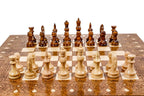 Wooden chess set with ornamental pattern and backgammon board
