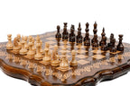Wooden chess board featuring detailed custom carved outline craftsmanship