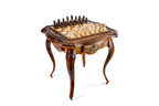 Wooden chess table set up with hand-carved chess pieces
