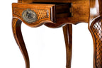 Diamond-lattice carved leg panel of the wooden chess table
