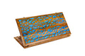 Exterior view of the wooden backgammon board featuring striking epoxy resin details.