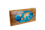 World map walnut backgammon set closed, front view of the epoxy map panel in the lattice lid