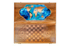 Front cover with the world map above the back cover with the chequerboard, seen from above