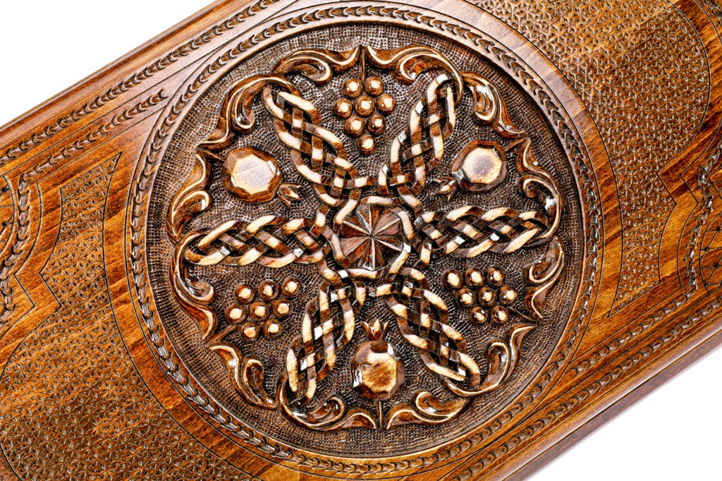 The interior view of the open wooden backgammon set highlighting the smooth grain and the professional-grade playing pips.