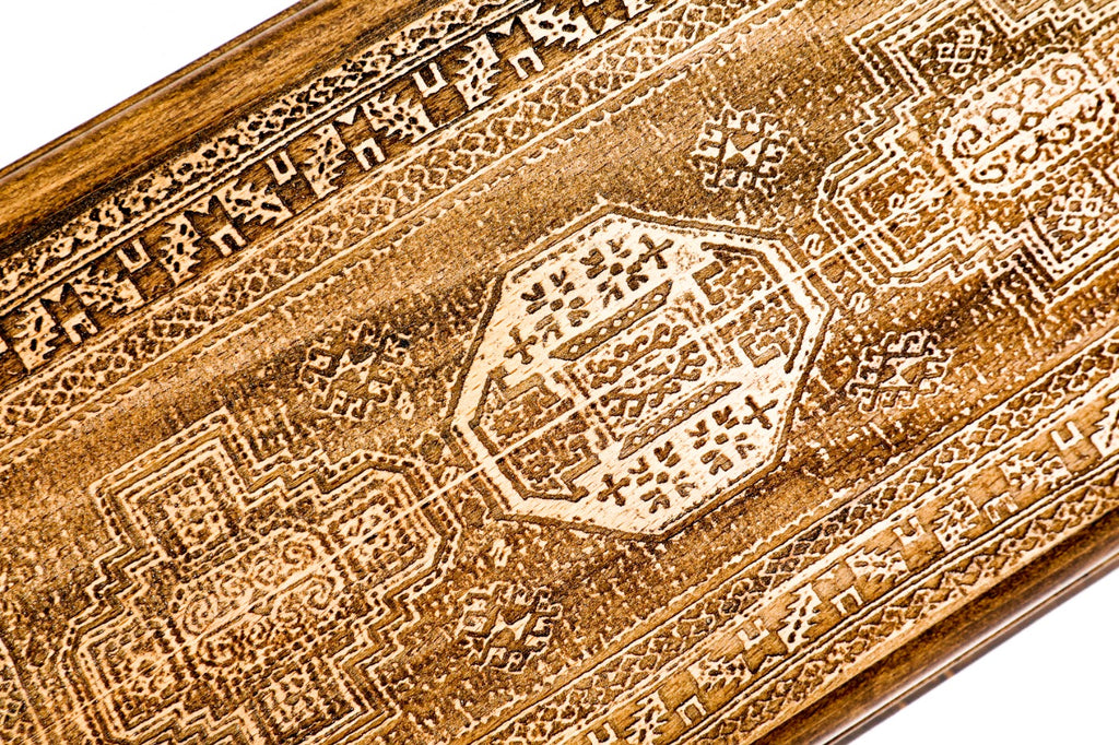 The open interior of the classic backgammon set showing the rich natural wood grain and perfectly aligned pips.