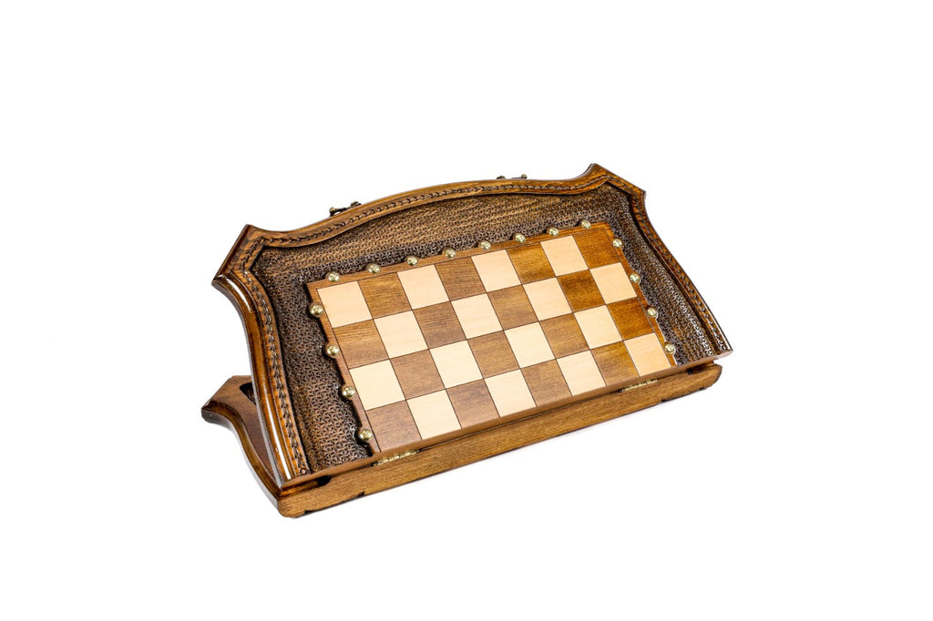 Closed contour-outline chess board standing on edge, showing the curved carved frame