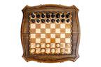 Top-down view of the contour outline chess set with all 32 pieces in starting position