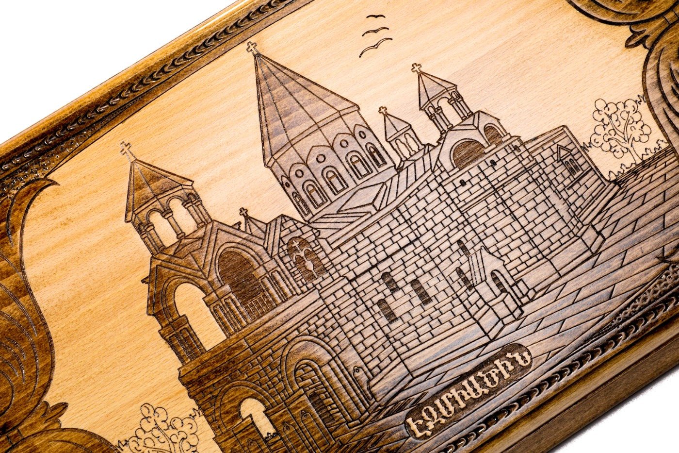 The interior view of the open Holy Etchmiadzin backgammon set highlighting the smooth grain and professional pips.