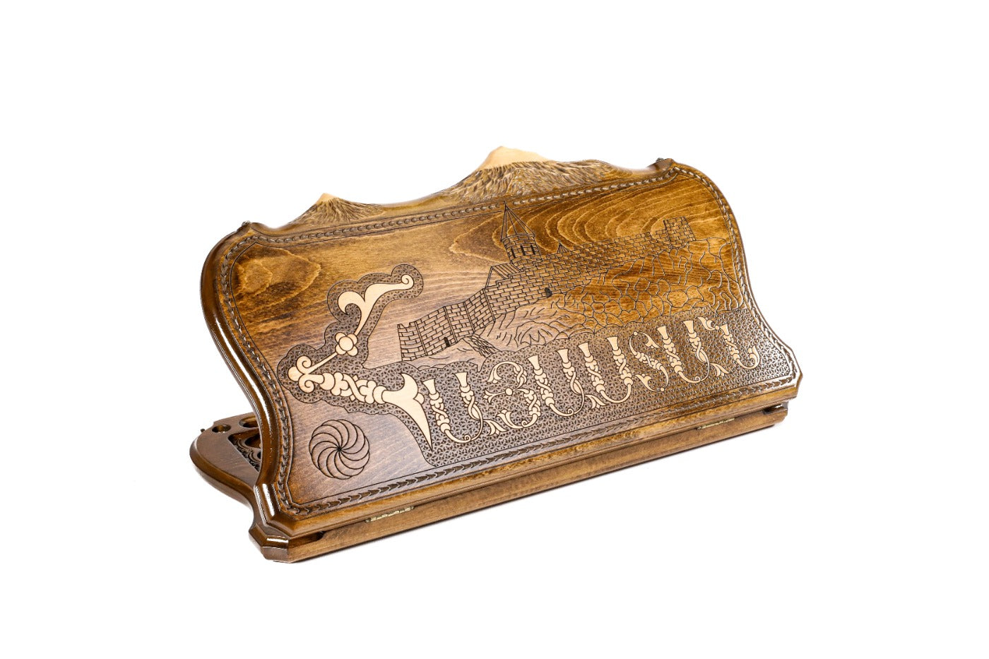 A frontal view of the closed backgammon case showcasing the 3D architectural carving of Khor Virap and the Ararat mountain outline.