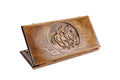 A frontal shot of the closed Horse classic backgammon board by Hrachya Ohanyan showing the detailed high-relief horse carving.