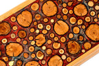 Top-down view of the unique wood grain and resin artistry on the solid wood exterior.