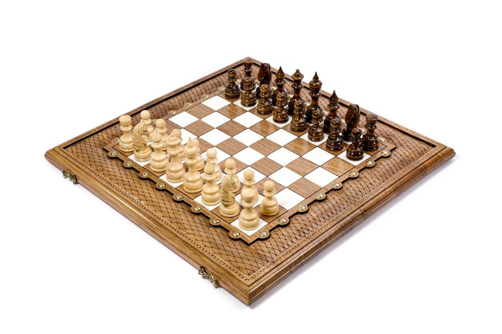 Luxury wooden chess set in solid walnut with diamond carved border and brass accents — by Hrachya Ohanyan