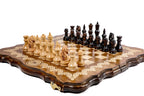 Wooden chess board featuring decorative contour design and fine craftsmanship