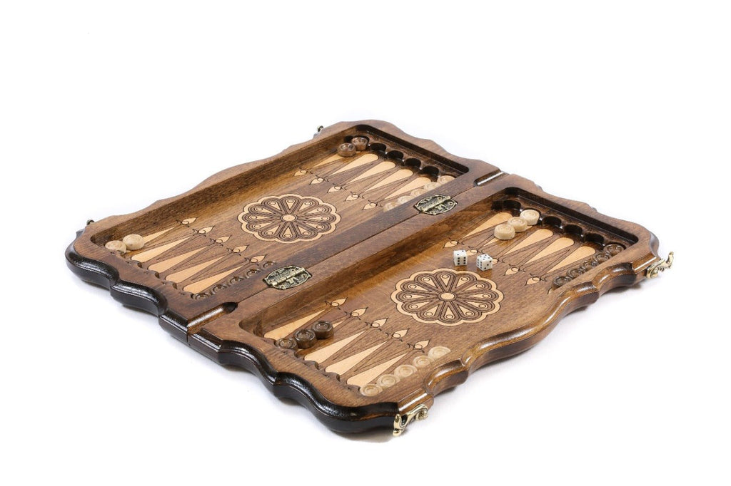 Handcrafted chess set with patterned design and integrated backgammon board
