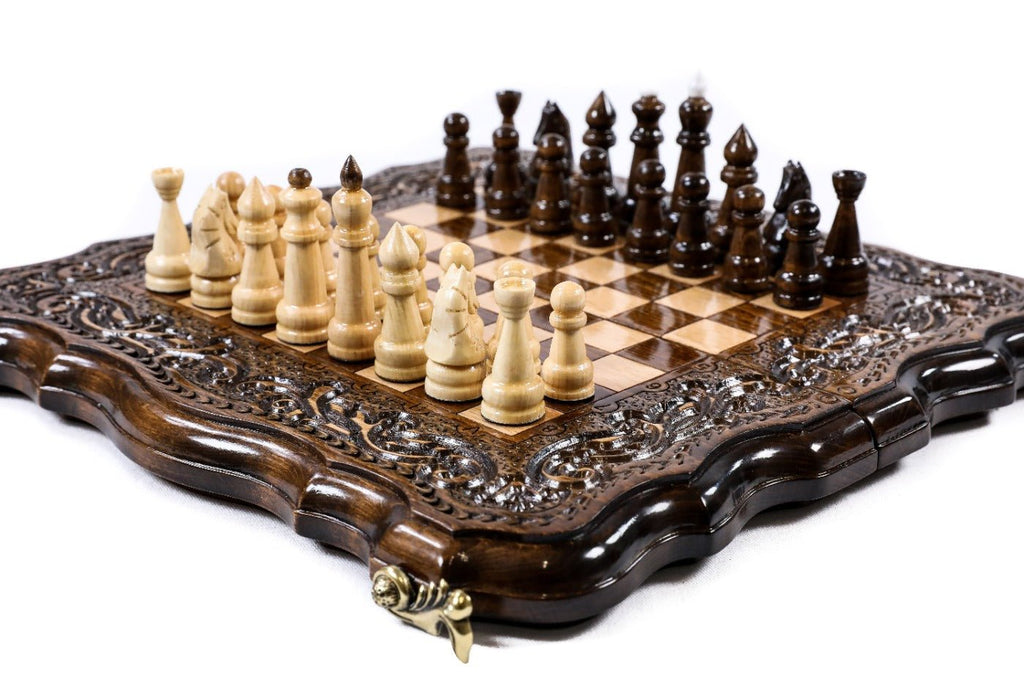Wooden chess board with detailed carved patterns and handcrafted finish