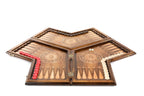 An angled view of the closed three-player board highlighting the complex geometric hand-carvings by Hrachya Ohanyan.