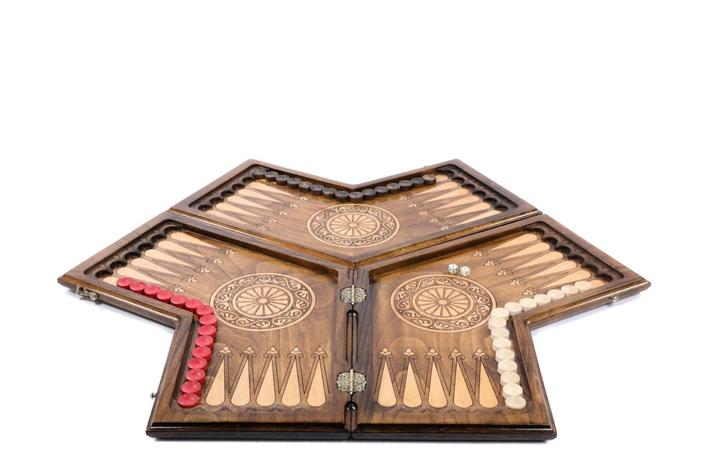 An angled view of the closed three-player board highlighting the complex geometric hand-carvings by Hrachya Ohanyan.