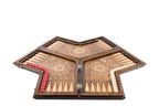 An angled view of the closed three-player board highlighting the complex geometric hand-carvings by Hrachya Ohanyan.