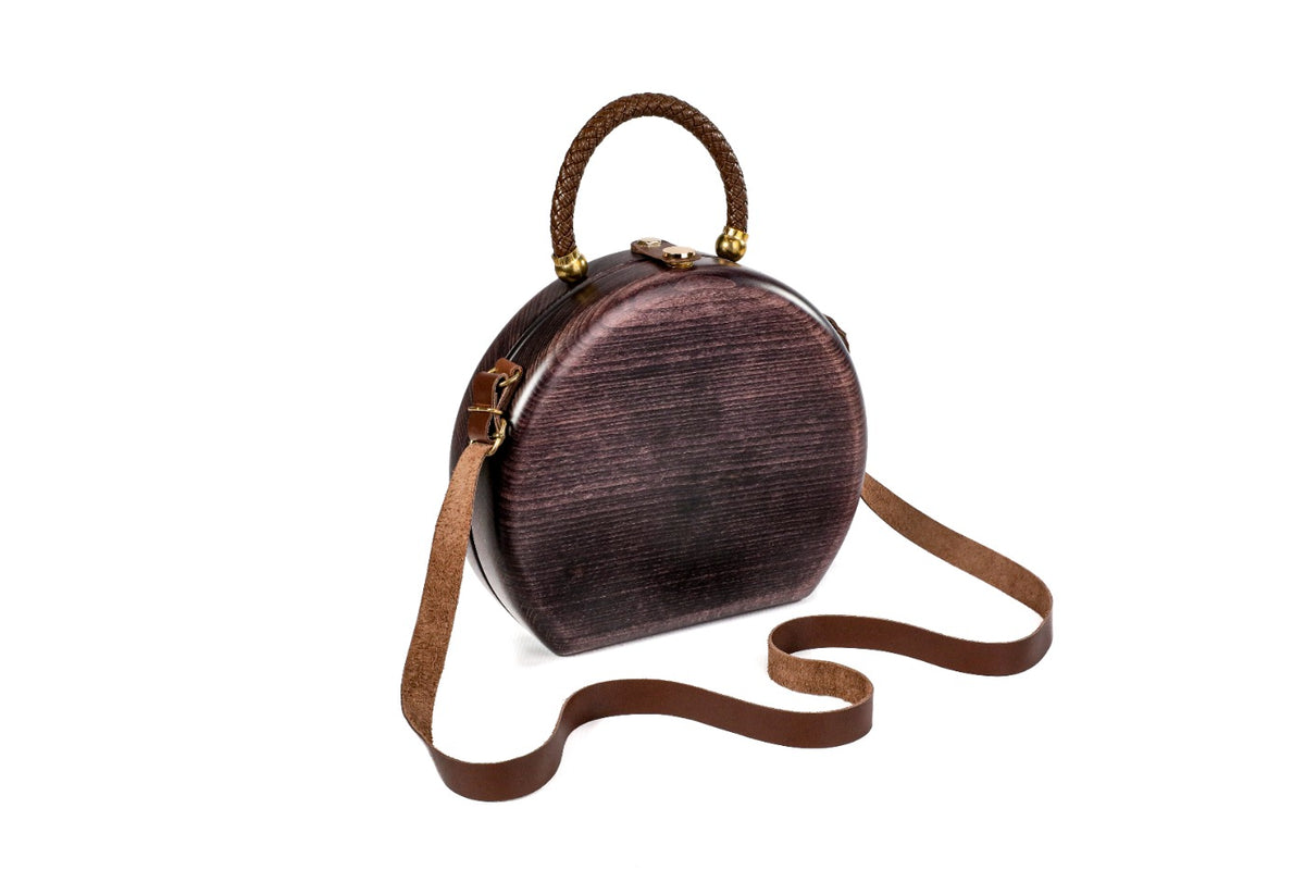 Dark plum wooden bag with leather strap — side view